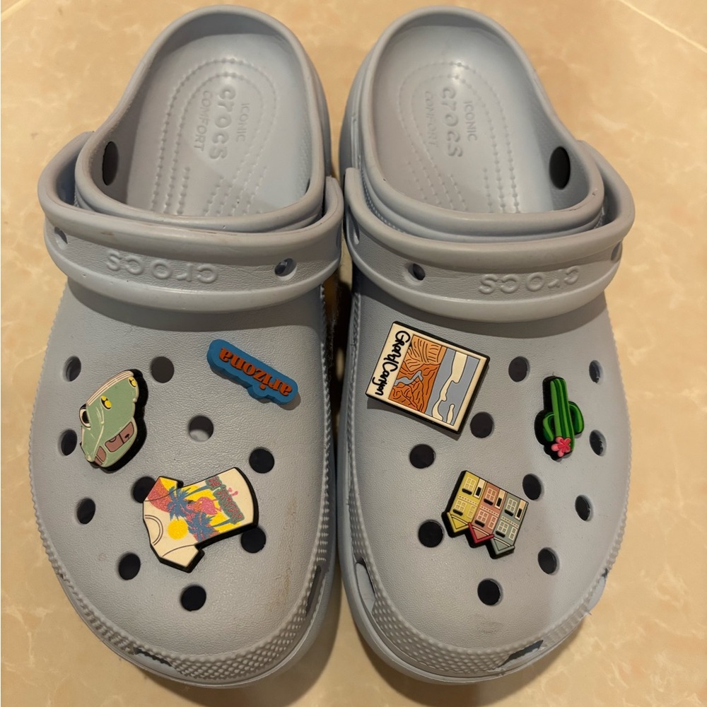 CROCS womens Sky Blue Slippers with  Charms